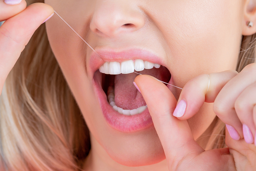 Here’s How To Use Dental Floss For The Best Results