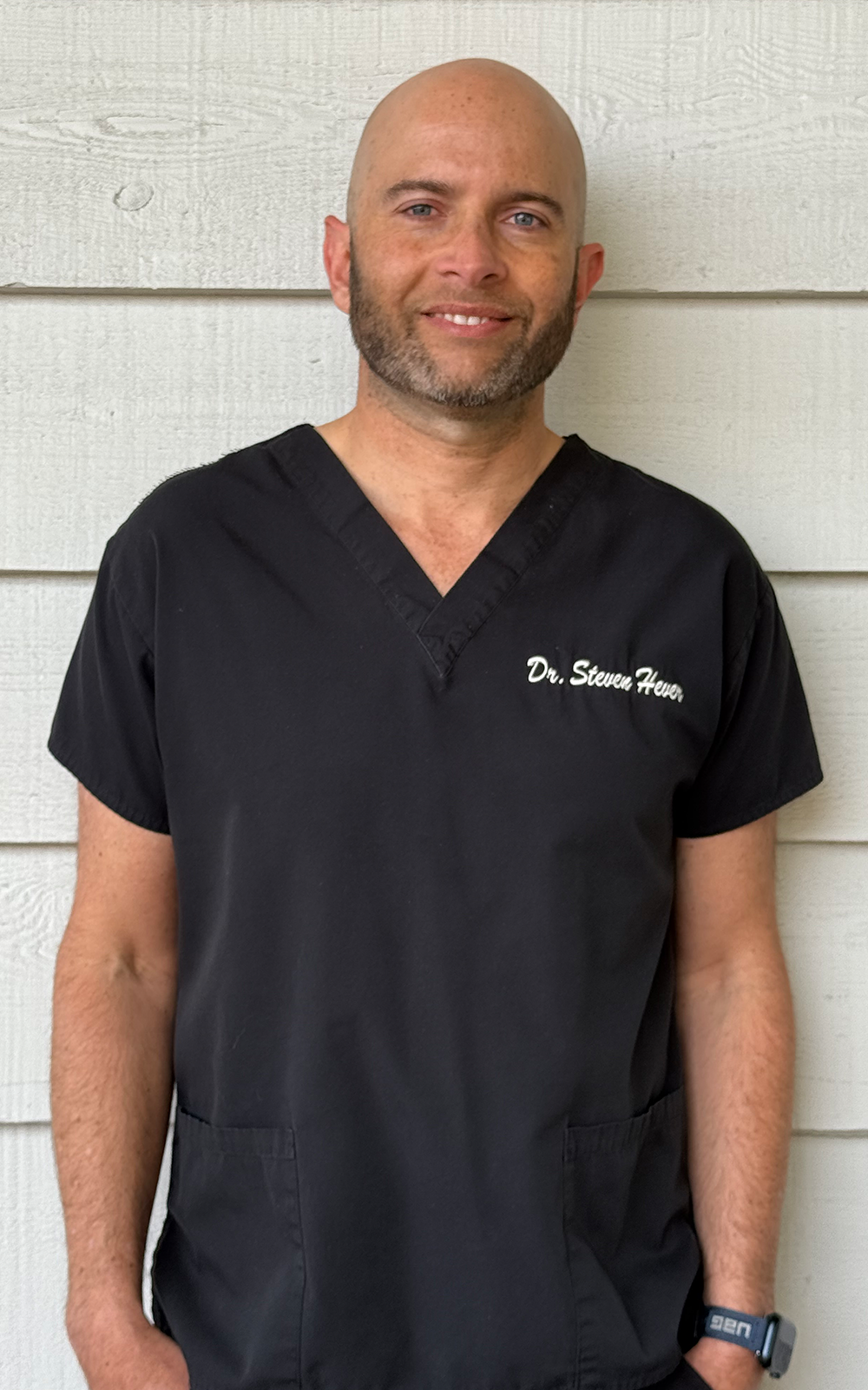 Dr. Steven in his office.